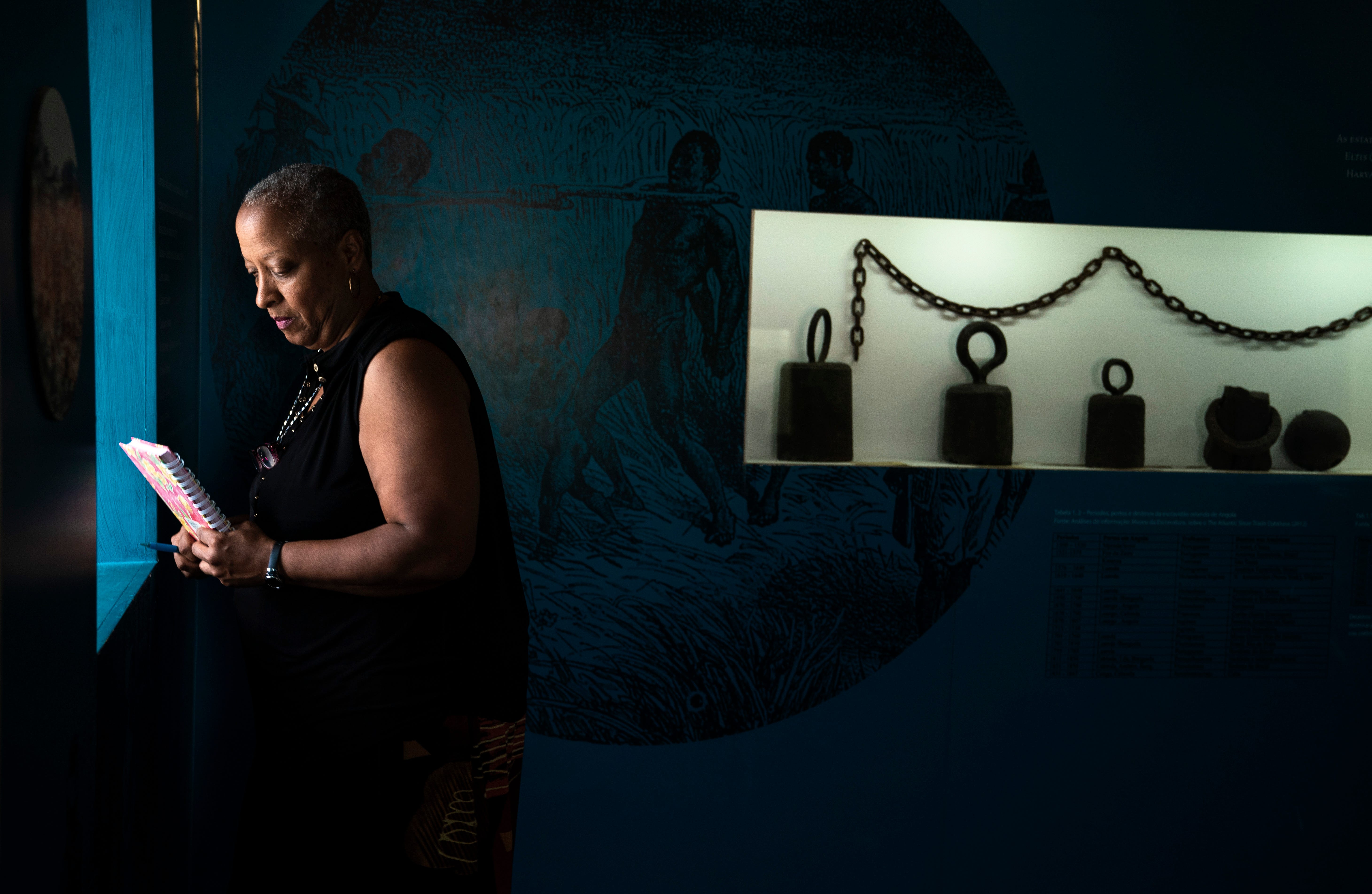 Wanda Tucker takes a moment to reflect at the National Museum of Slavery in Morro Da Crus on Sunday, July 28, 2019.