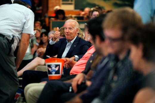 Democratic presidential candidate and former Vice President Joe Biden reacts as he sits in the audience at the Iowa Democratic Wing Ding at the Surf Ballroom on Aug. 9, 2019 in Clear Lake, Iowa.