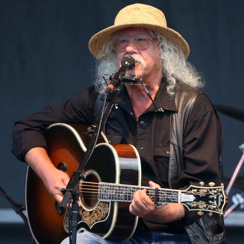 Arlo Guthrie performs at the 50th Anniversary of t