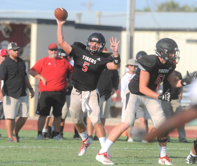 Anson senior quarterback Drew Hagler (5) throws a pass during a scrimmage against Colorado City on Friday, Aug. 16, 2019, at Tiger Stadium in Anson.