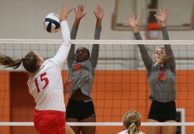 Miles High School's Regan Smithwick (15) goes up for an attack against San Angelo Central's Kameryn Daniels (9) and Presley Knowlton (12) during the 2019 Nita Vannoy Memorial Volleyball Tournament on Friday, August 16, 2019.