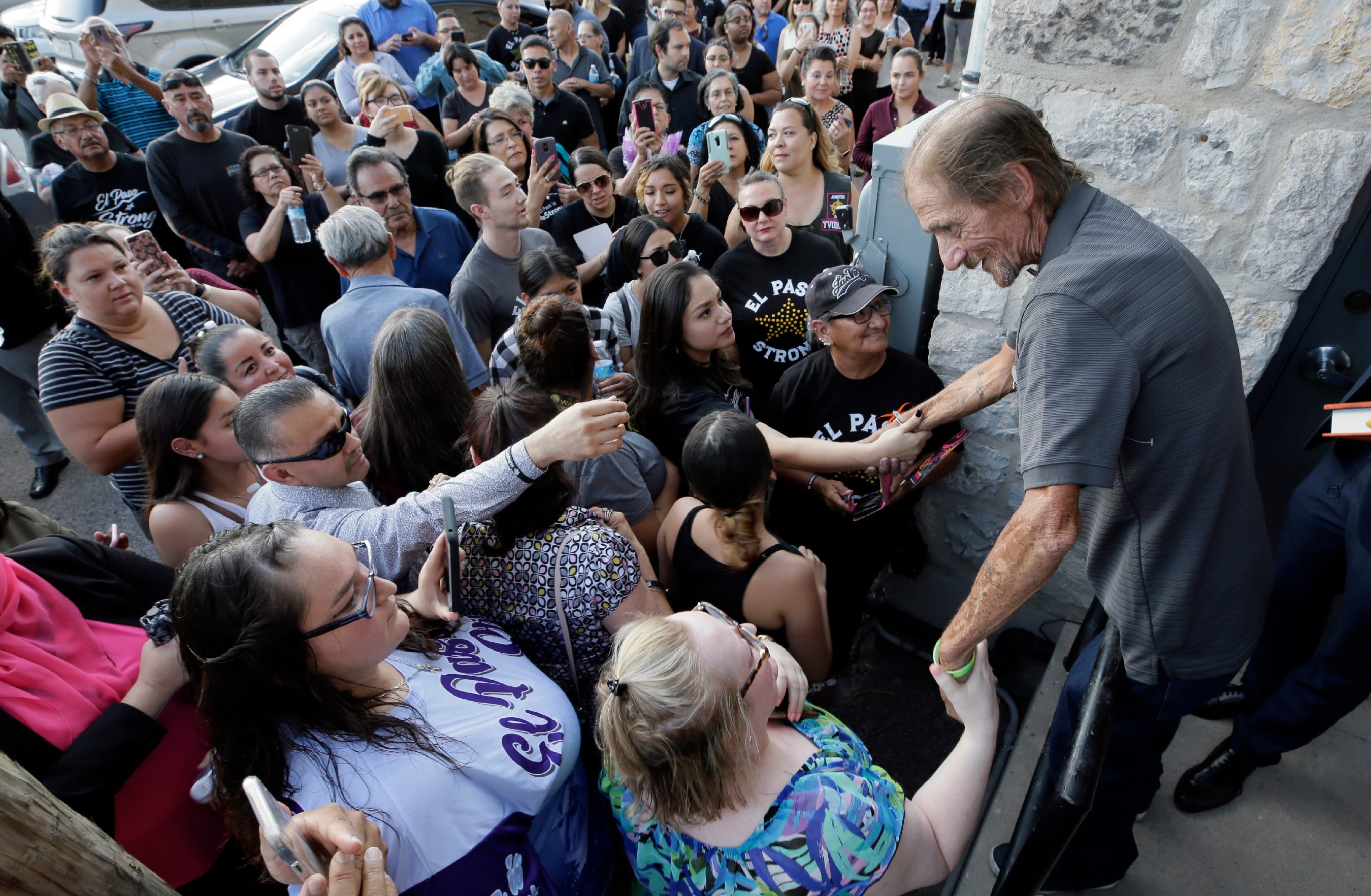 Antonio Basco greets some of the thousands in line to attend his wife Margie Reckard’s prayer service at La Paz Faith Center in El Paso, Texas, on Friday, Aug. 16, 2019. Without family in town, Basco invited the public to his wife’s funeral services and El Pasoans showed up in droves. Twenty-three people were killed in the Walmart mass shooting on Aug. 3, 2019.