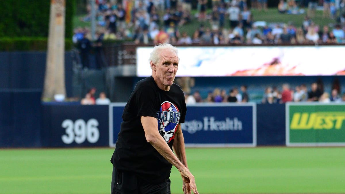 Bill Walton throws out the ceremonial first pitch before a game between the Colorado Rockies and San Diego Padres at Petco Park.