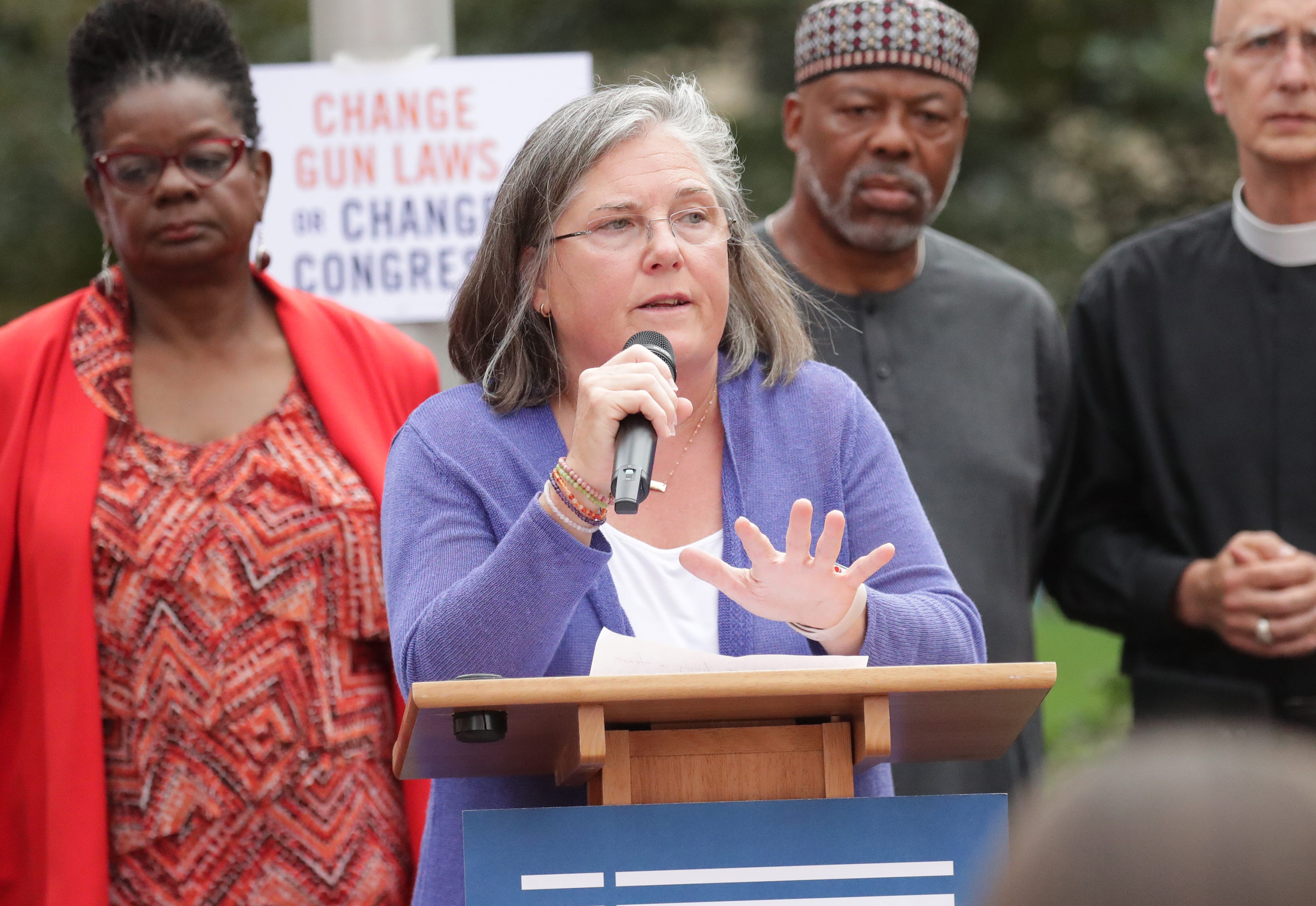 Carmen Pitre, shown here at a rally in 2019, is president and chief executive officer of Sojourner Family Peace Center.