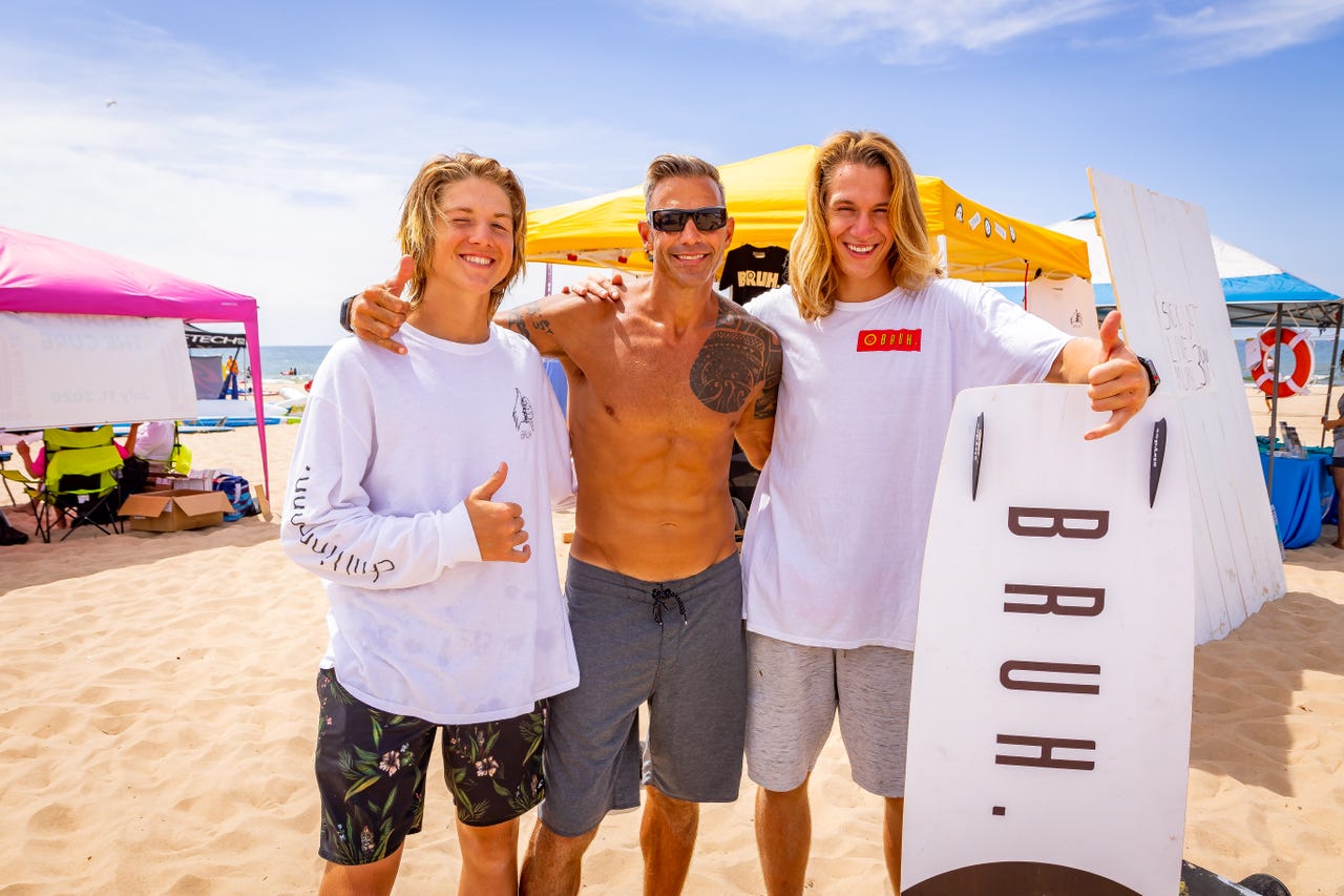 Brian LeFeve, owner of Great Lakes Surf Shop in St. Clair Shores is flanked by Nicholas Cobb, left, and Daniel Cobb, co-founders of Bruh, an apparel and board brand. The Cobb brothers see LeFeve as a mentor and friend who got them into water sports.