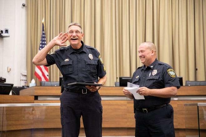 Sgt. Chris Akers retires from the Iowa City Police Department on August 14, 2019, at City Hall.