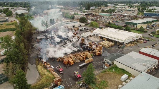 Crews battled a four-alarm blaze in northeast Salem early Monday on Salem Industrial Drive at pallet facility. Fire officials stated the blaze engulfed a large number of wooden pallets but crews had made progress and had the fire spread contained as of 6 a.m.