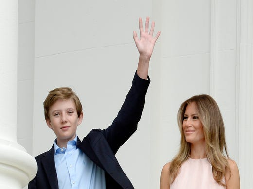 Barron Trump taller than mom in heels sporting new haircut