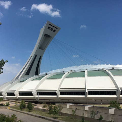 Olympic Stadium and Montreal Tower, the world's ta