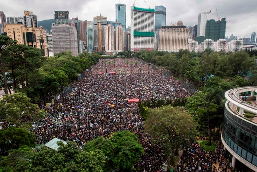 Protesters gather for a rally in Victoria Park in Hong Kong on Aug. 18, 2019, in the latest opposition to a planned extradition law that has since morphed into a wider call for democratic rights in the semi-autonomous city. Hong Kong democracy activists gathered Aug. 18 for a major rally to show the city's leaders their protest movement still attracts wide public support despite mounting violence and increasingly stark warnings from Beijing.