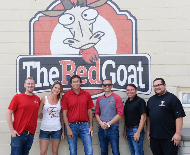 Chris Lease, Ali Lease, Mike Lease, Joshua Lease, Mark Lease and Billy Reinholdt pose for a picture at The Red Goat Friday, Aug. 16, 2019, in Watkins.