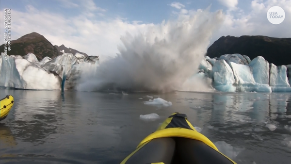 Kayakers hit with massive wave after glacier colla