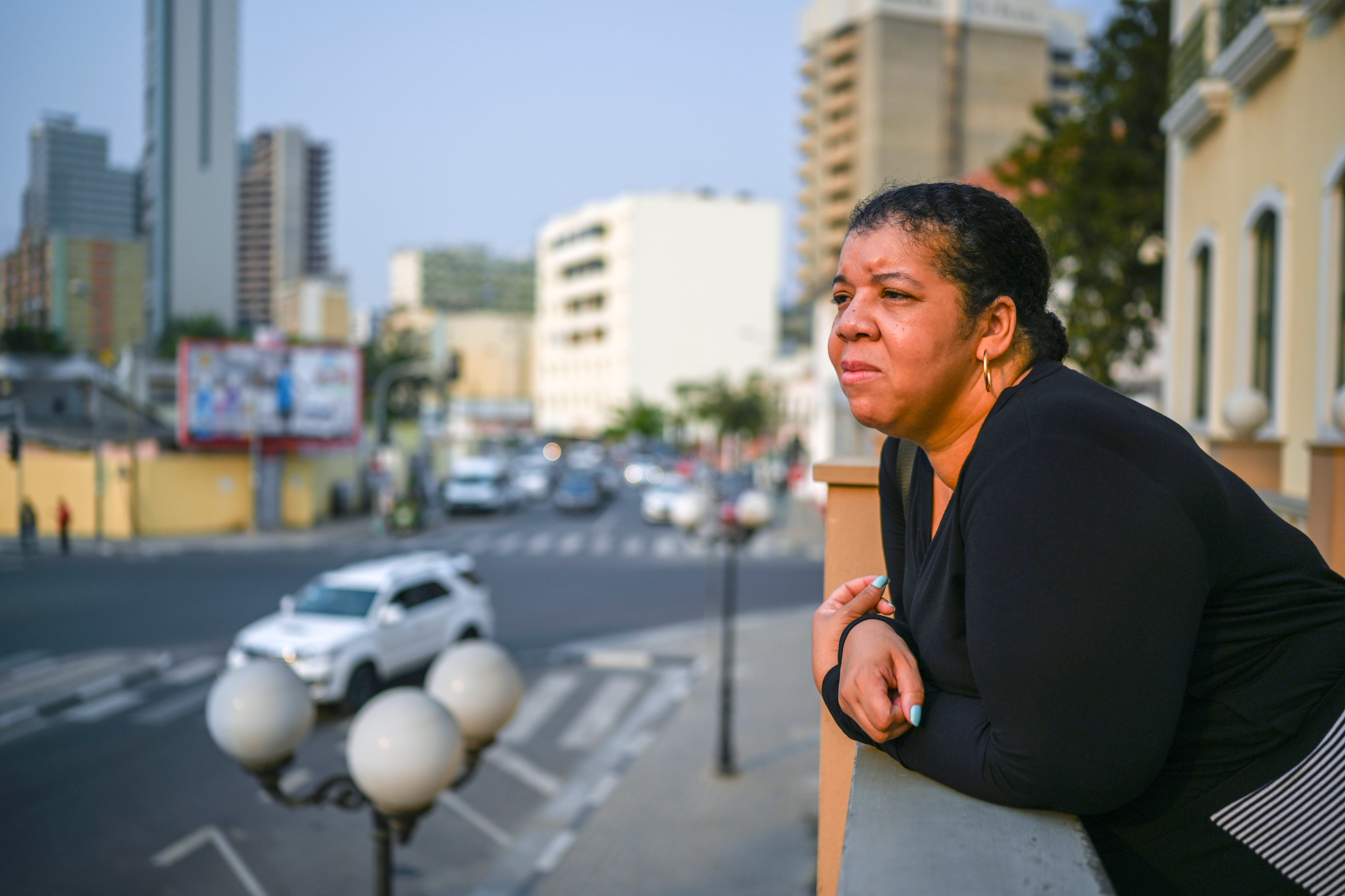 Nichelle Smith stands outside the palace of colonial-era female slaveholder Dona Ana Joaquina in downtown Luanda. Smith edits USA TODAY's Black History Month publication. Much of her research was used to take the reporting team to Angola and the origins of slavery.