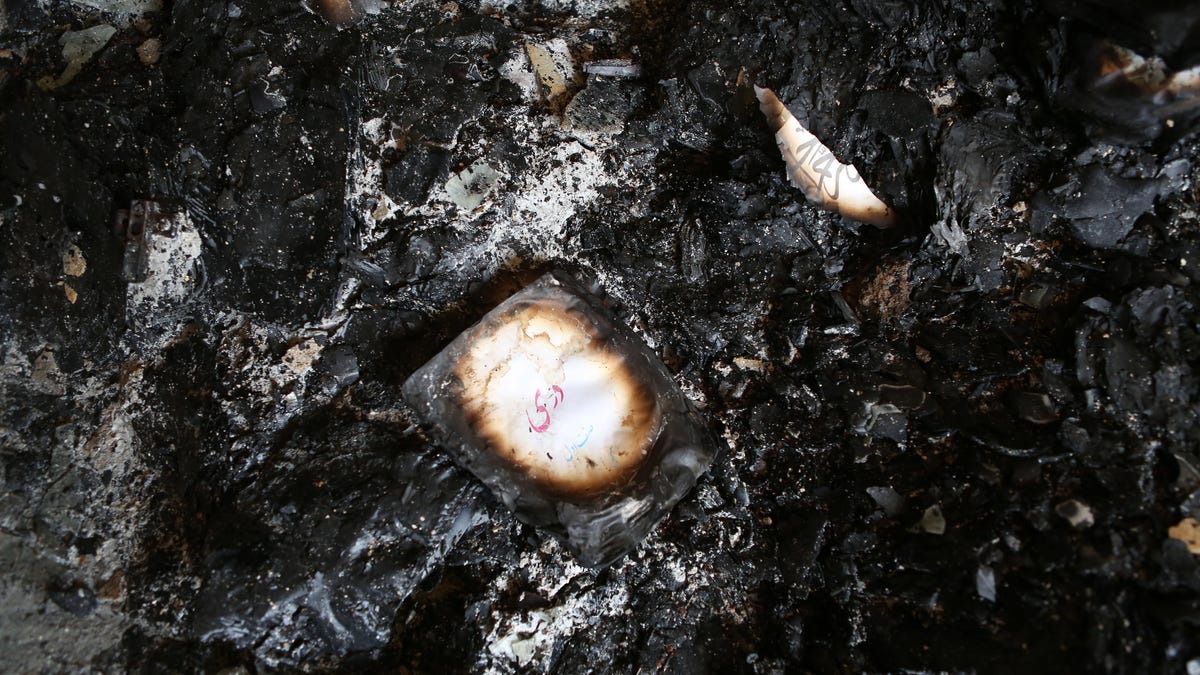 A burned book in Kabul on Aug. 20, 2019, after Taliban gunmen allegedly set a girls high school on fire.