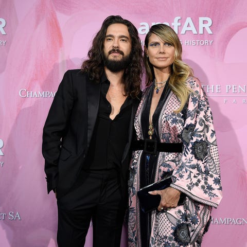 Tom Kaulitz and Heidi Klum attend the Amfar Gala...