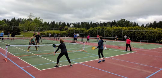 Image result for pictures of recent founders tournament of pickleball in bainbridge island