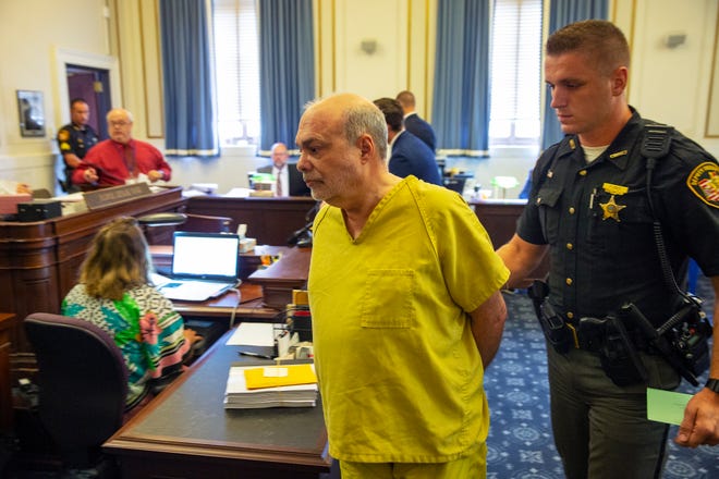 The Rev. Geoff Drew leaves his arraignment Wednesday, August 21, 2019 at the Hamilton County Courthouse. Judge Leslie Ghiz set bond at $5 million Wednesday for the priest accused of raping an altar boy 30 years ago.