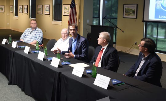 U.S. Sen. Tom Cotton (center) is flanked by (from left) Clint Czeschin, Calvin Czeschin, Lang Zimmerman and Dr. Robin Myers on Tuesday at a business round table discussion at Arkansas State University-Mountain Home.