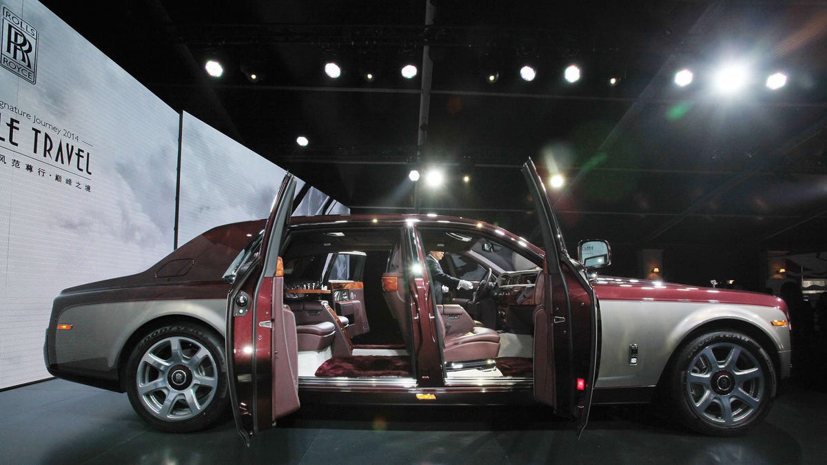 The Rolls-Royce Pinnacle Travel Phantom car is on display at the launch ceremony of their new Pinnacle Travel Phantom in Beijing on April 18, 2014, ahead of the "Auto China 2014" Beijing Automotive Exhibition.