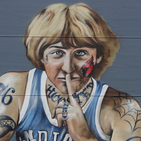 A mural of former NBA star Larry Bird is seen on t