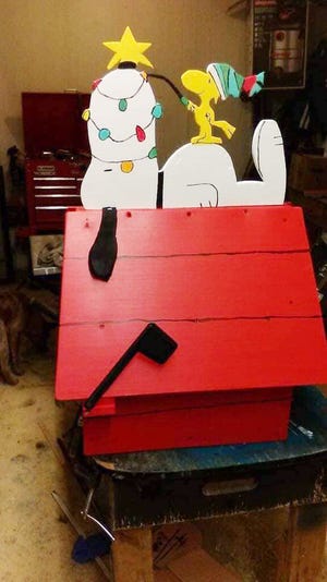A beloved Snoopy mailbox was returned to a woman the same day it went missing.