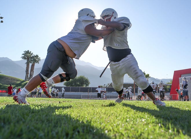 The Palm Springs High School football team practices for the upcoming season in Palm Springs, August 21, 2019.