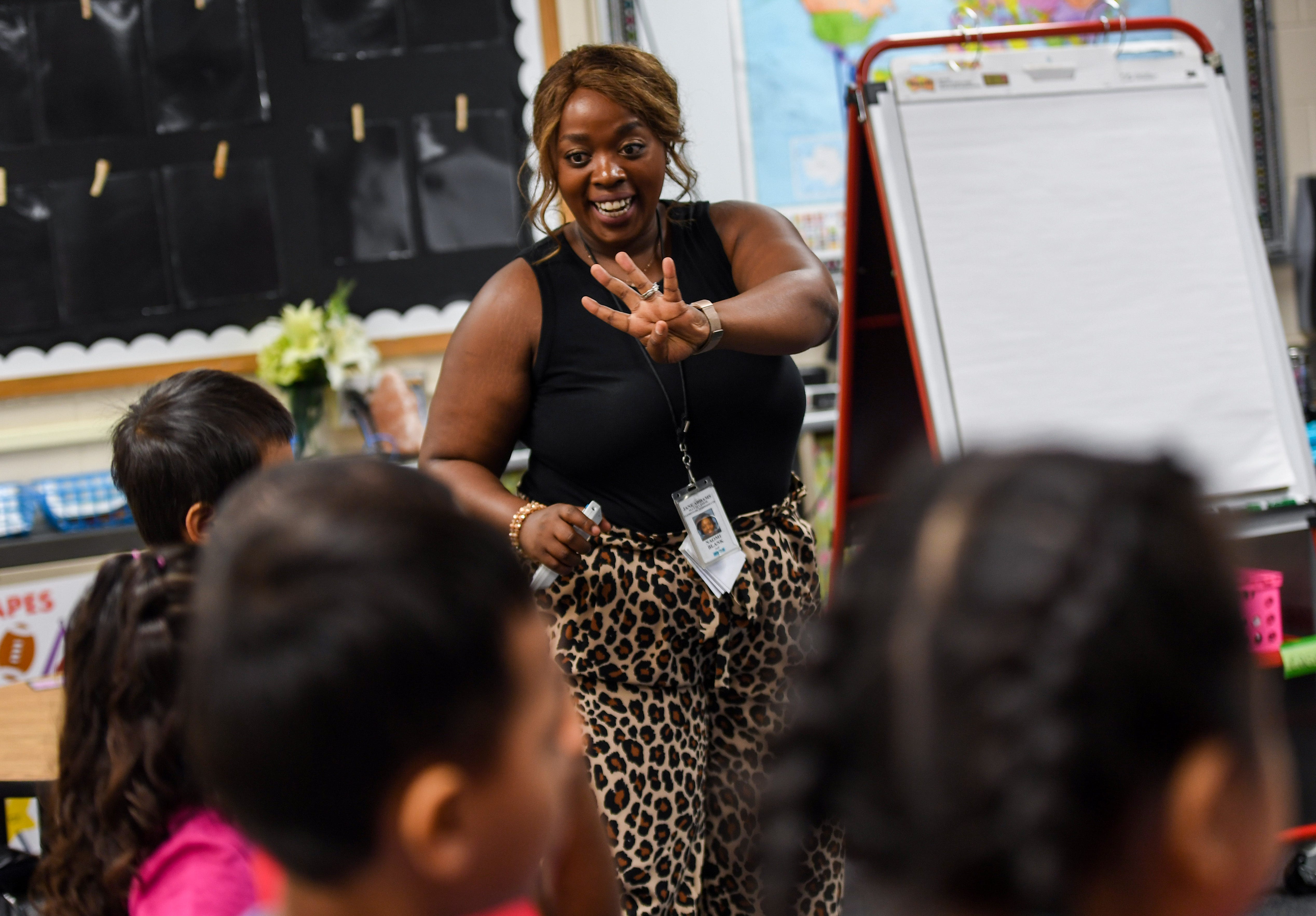 Naomi Blank teaches her English-learner students on the first day of the school year at Jane Addams Elementary School in Sioux Falls, S.D.