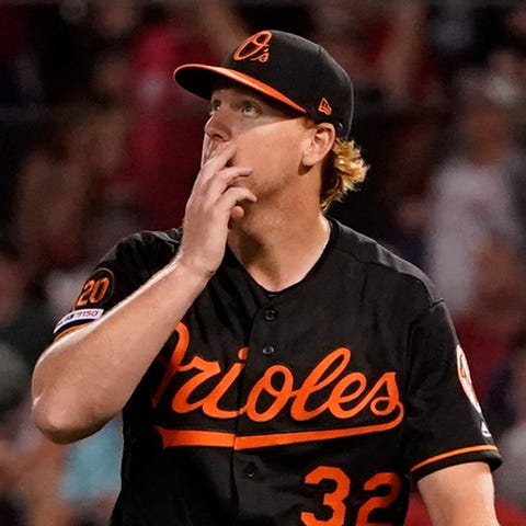 Orioles pitcher Tom Eshelman can only watch as Moo