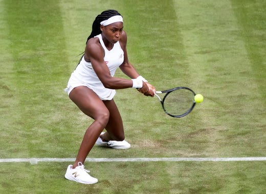 Coco Gauff in action against Venus Williams during the first round of Wimbledon in 2019.