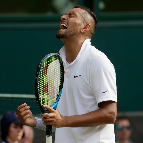 Australia's Nick Kyrgios reacts after winning a po