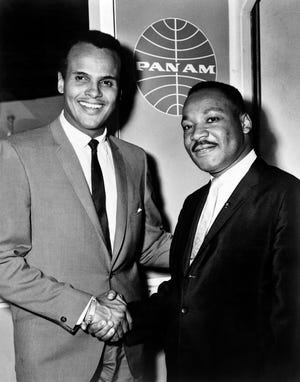 Belafonte and  Martin Luther King Jr. on Aug. 21, 1964, at JFK International Airport.