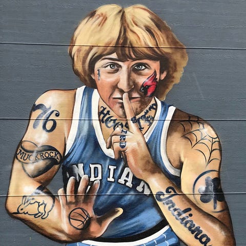 A side-by-side comparison of Jules Muck's mural de