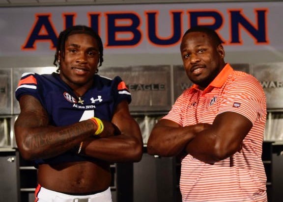 Auburn running back commit Tank Bigsby (left) with running backs coach Cadillac Williams (right) during a recruiting visit.