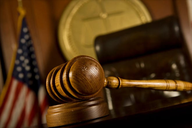 Two men from Robeson County and a co-conspirator were sentenced in federal court on drug and firearms charges.