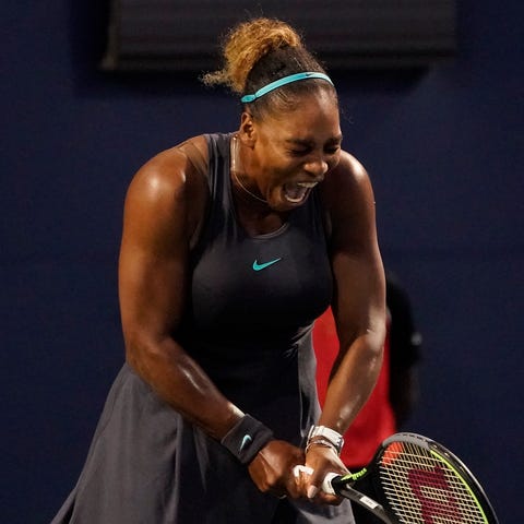 Serena Williams (USA) reacts after winning a rally