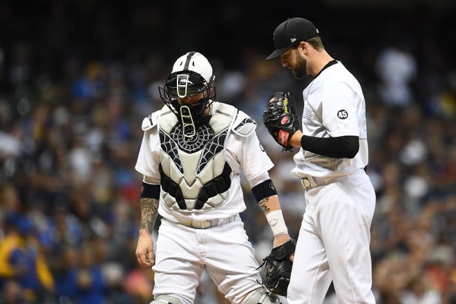 Brewers catcher Yasmani Grandal and starter Jordan Lyles were among nine Brewers to exercise their rights to free agency.