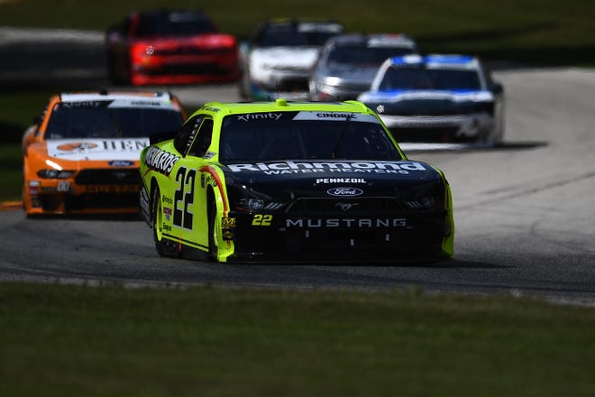 Austin Cindric leads a pack of cars during the 2019 NASCAR Xfinity Series race at Road America.