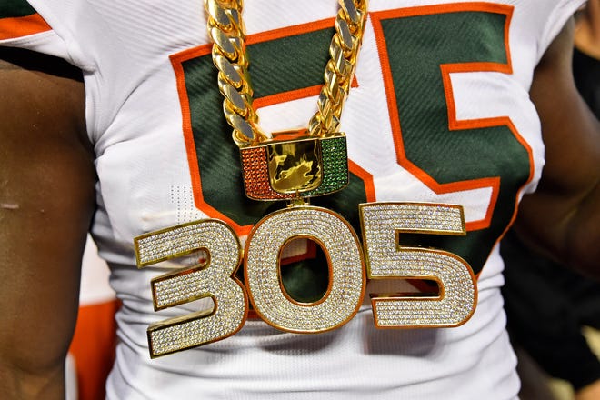 A detailed view of the new Miami Hurricanes' turnover chain worn by linebacker Shaquille Quarterman.