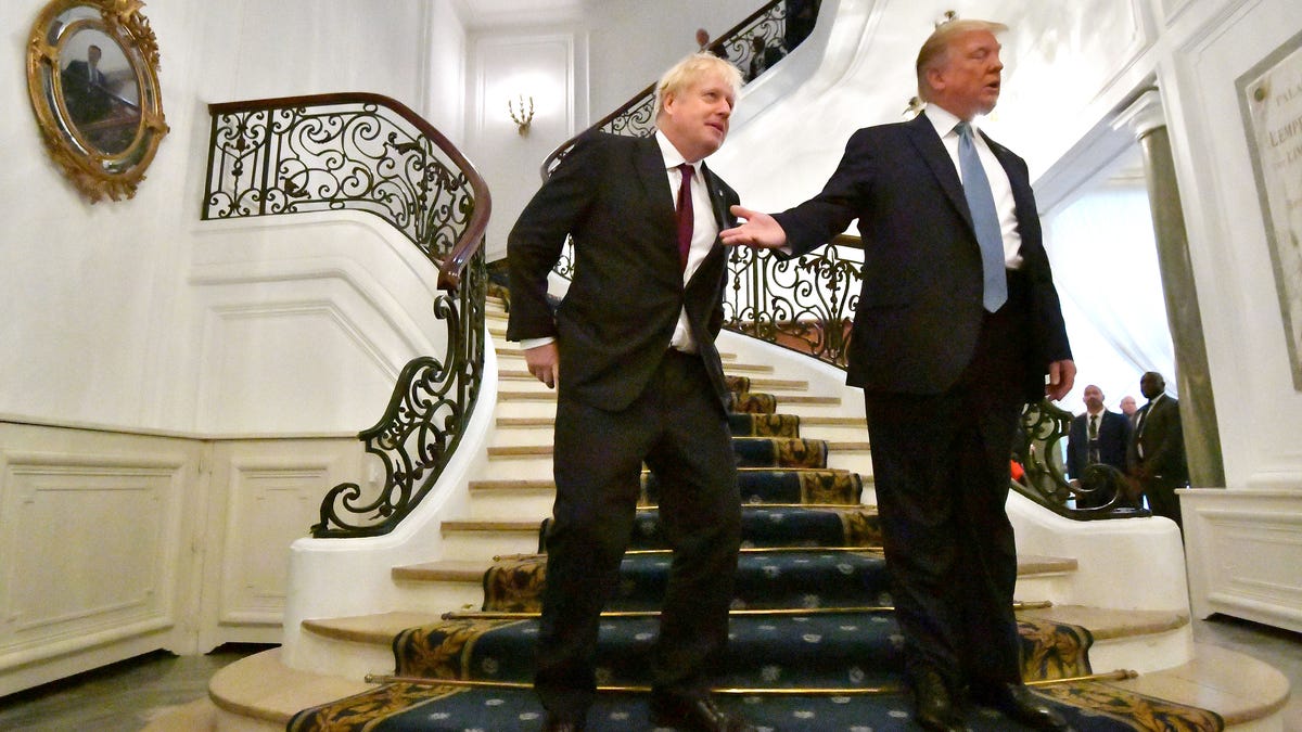 President Donald Trump and Britain's Prime Minister Boris Johnson arrive for a bilateral meeting during the G7 summit  in Biarritz, France.
