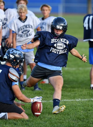 Emma Domka winds up to kick a field goal during practice Wednesday, Aug. 21, 2019, at Becker High School. 