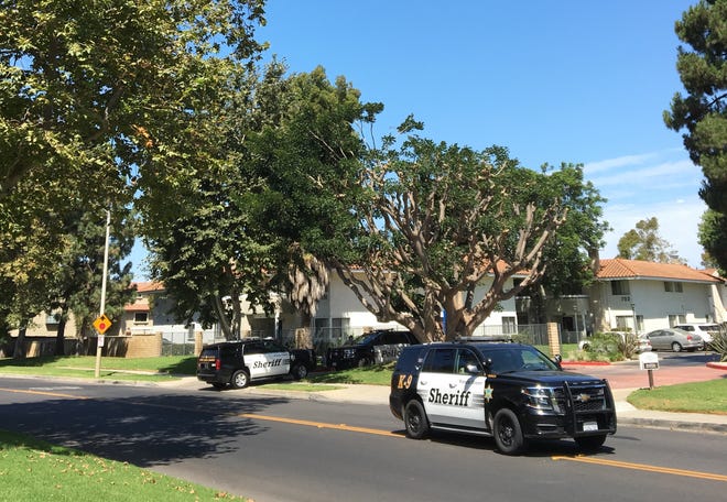 Patrol vehicles from the Ventura County Sheriff's Office are parked on Paseo Camarillo in Camarillo Monday morning after a search for a suspect in a domestic violence incident.