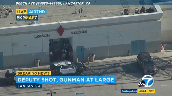 FILE - This Wednesday, Aug. 21, 2019 file image taken from video provided by KABC-TV shows the outside of a Los Angeles County sheriff's station in Lancaster, Calif. The Los Angeles County Sheriff's Department says a deputy who claimed he was shot in a station parking lot earlier this week was lying. Assistant Sheriff Robin Limon said at a news conference late Saturday that Wednesday's "reported sniper assault was fabricated" by Angel Reinosa. The 21-year-old deputy told authorities he used a knife to damage his uniform shirt. He's been relieved of duties and will face a criminal investigation. He didn't explain his motive. (KABC-TV via AP, File)