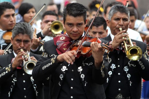 Mariachis perform during the 26th Mariachi and Charro International Festival in Guadalajara, Mexico, on Aug. 25, 2019. Mariachi music was declared by UNESCO in 2011 as part of the Intangible Cultural Heritage of Humanity. 