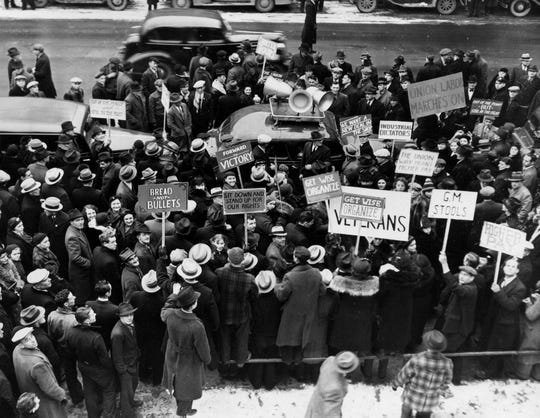 Demonstrators gather outside of General Motors Plant #2 in Flint during a strike in the winter of 1937.