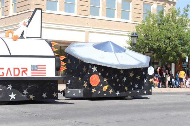 Solitaire Homes took the top prize at the Columbus Electric Co-op Tournament of Ducks Parade. The tail-end of the float featured a racing duck leisurely resting on the tail of a replica space shuttle and an out-of-this-world flying saucer trailing.