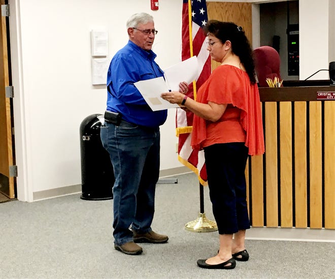 Mayor Cynthia Atencio swears in newly appointed City Councilor Sam Mohler, Monday, Aug. 26, 2019, during a Bloomfield City Council meeting.