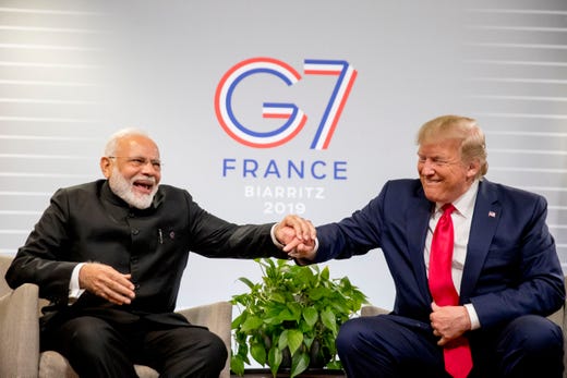 President Donald Trump and Indian Prime Minister Narendra Modi share a laugh together during a bilateral meeting at the G-7 summit in Biarritz, France, Aug. 26, 2019.