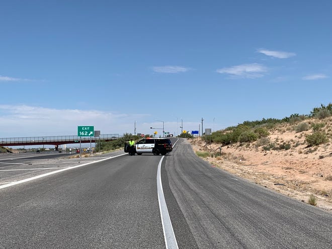 Authorities block Exit 162 to NM 404 on Wednesday, Aug. 28, 2019.