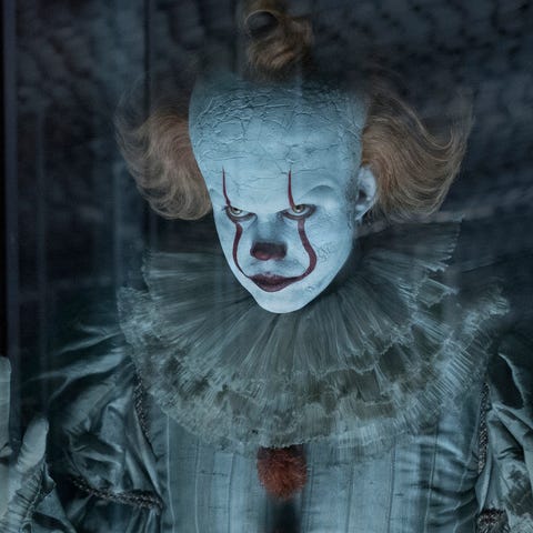 Pennywise (Bill Skarsgard) creeps out the adult Lo