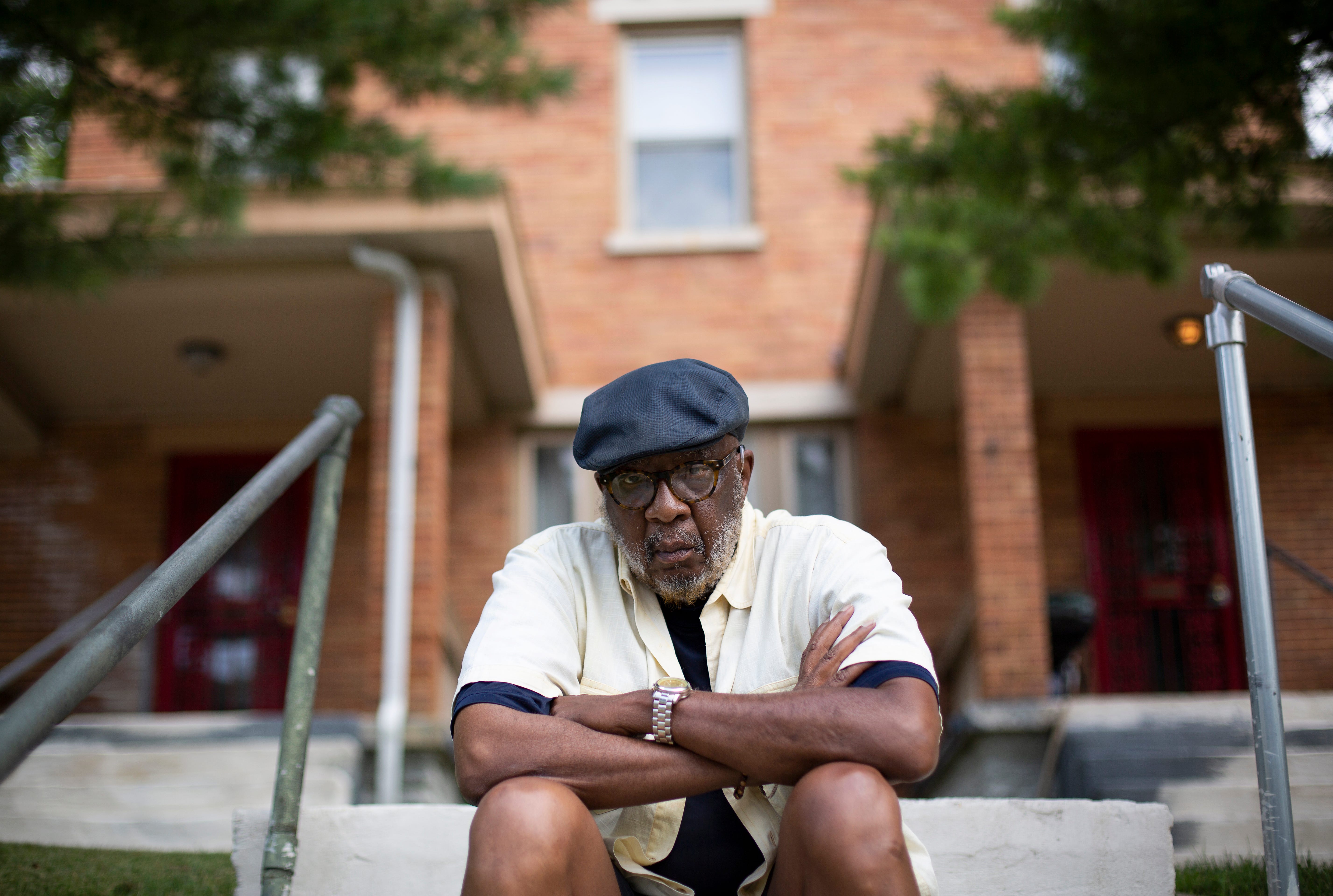 Jerome Madigan, 72, lived in the house behind him on Larona Avenue in Avondale for 68 years. He sold it in 2015 after corporate expansion consumed many of his neighbors' homes.